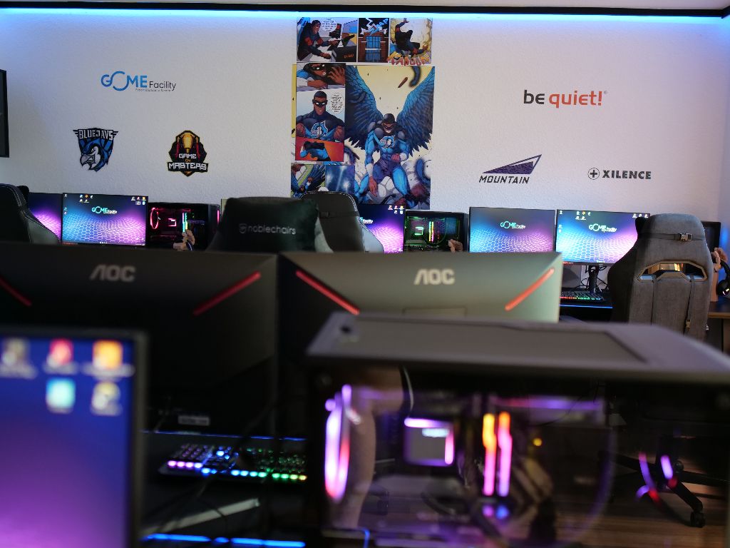 Gaming-Wall und Partneratmosphäre in der GOME Facility